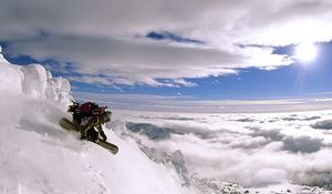 Preview wallpaper top, snowboard, descent, sky, extreme, height, clouds