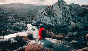 Preview wallpaper tourist, girl, travel, stones, rocks