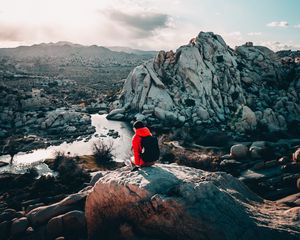 Preview wallpaper tourist, girl, travel, stones, rocks