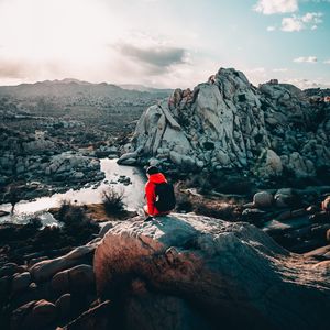 Preview wallpaper tourist, girl, travel, stones, rocks