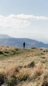 Preview wallpaper tourist, mountains, fog, path, landscape