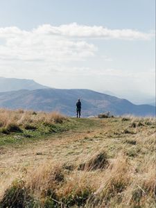 Preview wallpaper tourist, mountains, fog, path, landscape