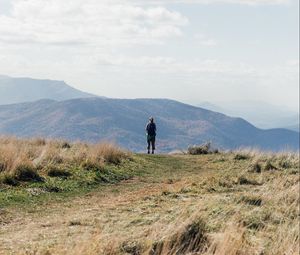 Preview wallpaper tourist, mountains, fog, path, landscape