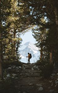 Preview wallpaper tourist, silhouette, forest, trees, mountain, nature