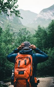 Preview wallpaper tourist, traveler, backpack, cap, forest