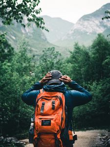 Preview wallpaper tourist, traveler, backpack, cap, forest