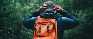 Preview wallpaper tourist, traveler, backpack, cap, forest