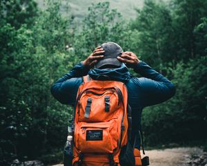 Preview wallpaper tourist, traveler, backpack, cap, forest