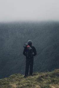 Preview wallpaper tourist, traveler, backpack, fog, mountains
