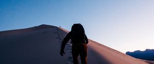 Preview wallpaper tourist, traveler, desert, sand, backpack