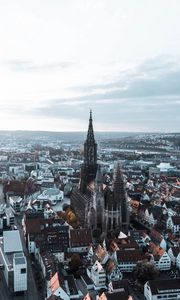 Preview wallpaper tower, architecture, city, buildings, roofs