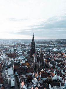 Preview wallpaper tower, architecture, city, buildings, roofs