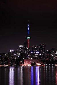 Preview wallpaper tower, backlight, buildings, lights, river, night, city