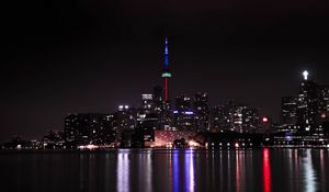 Preview wallpaper tower, backlight, buildings, lights, river, night, city