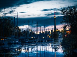 Preview wallpaper tower, boats, water, reflection, twilight