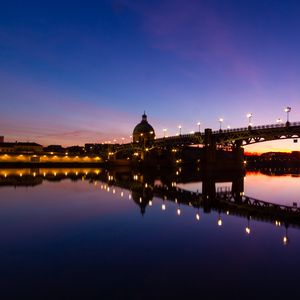 Preview wallpaper tower, bridge, lights, reflection, river, evening