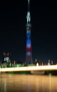 Preview wallpaper tower, building, architecture, blur, city, backlight