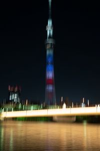 Preview wallpaper tower, building, architecture, blur, city, backlight