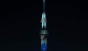 Preview wallpaper tower, building, architecture, blur, city, backlight