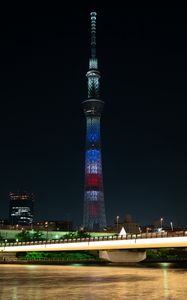 Preview wallpaper tower, building, architecture, night city, bridge, river