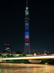 Preview wallpaper tower, building, architecture, night city, bridge, river