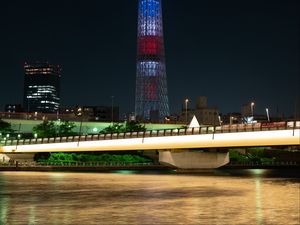 Preview wallpaper tower, building, architecture, night city, bridge, river