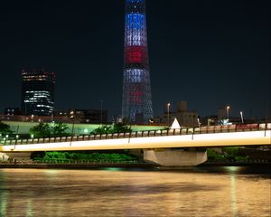 Preview wallpaper tower, building, architecture, night city, bridge, river