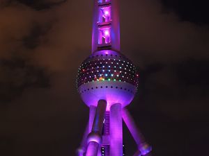 Preview wallpaper tower, building, architecture, backlight, purple