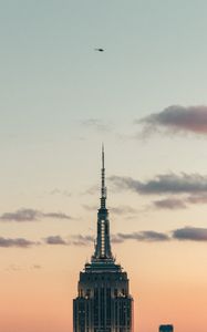 Preview wallpaper tower, building, architecture, sky, clouds, helicopter