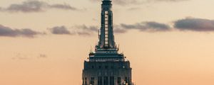 Preview wallpaper tower, building, architecture, sky, clouds, helicopter