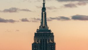 Preview wallpaper tower, building, architecture, sky, clouds, helicopter