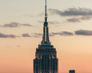 Preview wallpaper tower, building, architecture, sky, clouds, helicopter