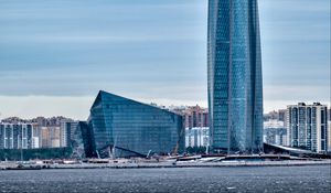 Preview wallpaper tower, building, architecture, glass, sea, houses