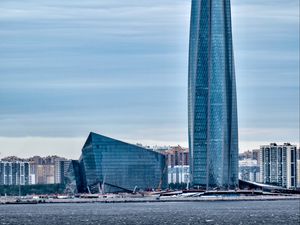 Preview wallpaper tower, building, architecture, glass, sea, houses