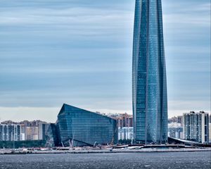 Preview wallpaper tower, building, architecture, glass, sea, houses