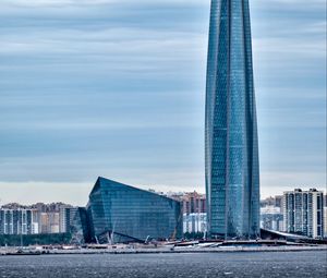 Preview wallpaper tower, building, architecture, glass, sea, houses