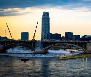 Preview wallpaper tower, building, construction, bridge, river
