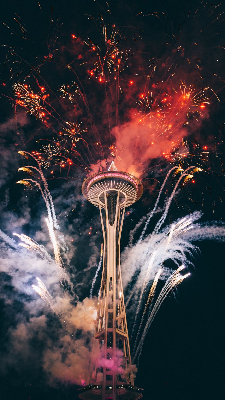 938x1668 Wallpaper tower, building, fireworks, holiday