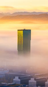 Preview wallpaper tower, building, fog, mountains, valley