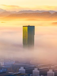 Preview wallpaper tower, building, fog, mountains, valley