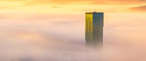 Preview wallpaper tower, building, fog, mountains, valley