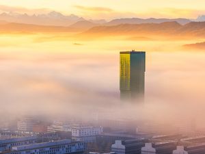 Preview wallpaper tower, building, fog, mountains, valley