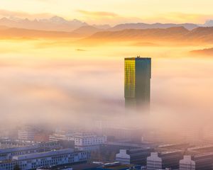 Preview wallpaper tower, building, fog, mountains, valley