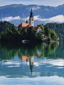 Preview wallpaper tower, building, lake, reflection, mountains
