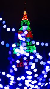 Preview wallpaper tower, building, lights, illumination, blur, new year, holiday