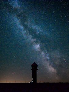 Preview wallpaper tower, building, silhouette, milky way, stars, night