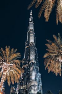 Preview wallpaper tower, building, skyscraper, architecture, palm trees