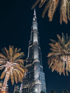 Preview wallpaper tower, building, skyscraper, architecture, palm trees