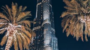 Preview wallpaper tower, building, skyscraper, architecture, palm trees