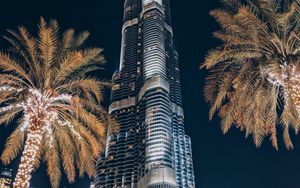 Preview wallpaper tower, building, skyscraper, architecture, palm trees